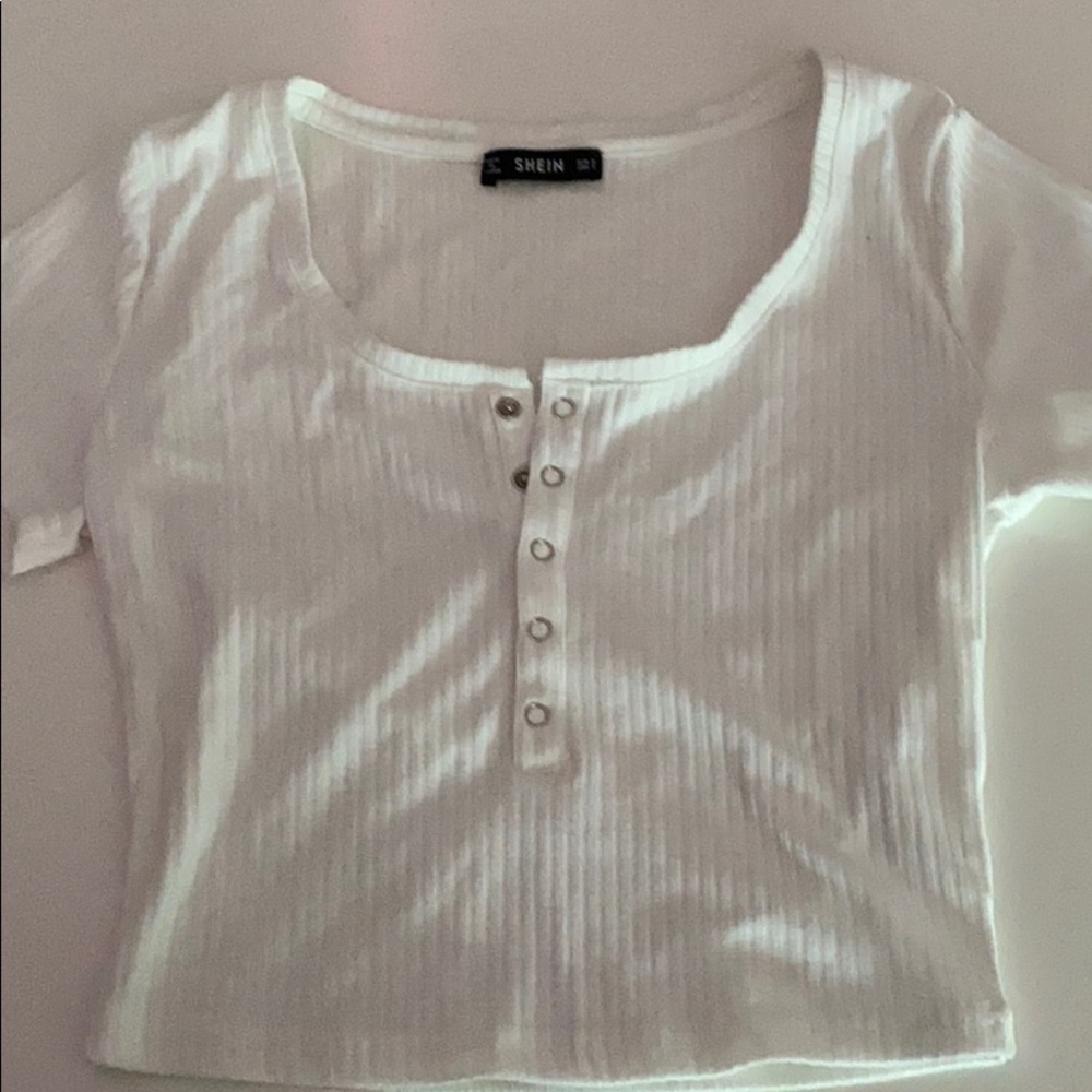 Button up top